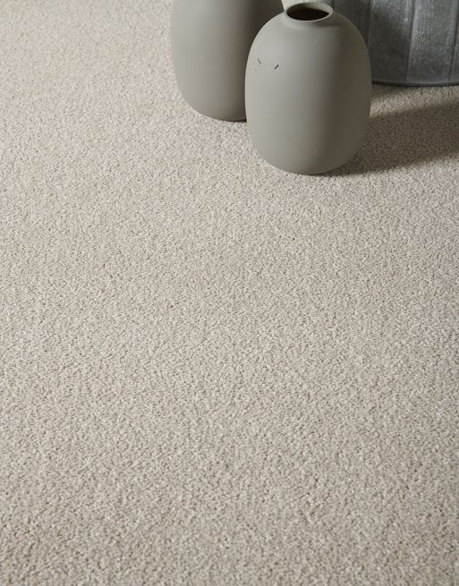 The compact pile of this carpet makes for a solid underfoot feel, giving support as you walk and is less likely to show footprints and other pile displacements.