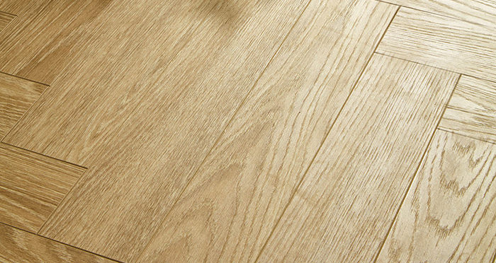 Vintage Chateau Herringbone - Light Almond Oak Laminate Flooring - Descriptive 2